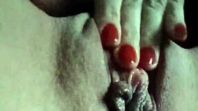 Horny Girl Squeezes Shaved Pussy Clit!