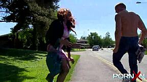 redhead ebony goddess relieves herself outdoors in public