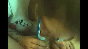 Redhead gives a very hot blowjob with a fruit roll up