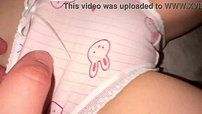 She experiences her first orgasm through masturbation.