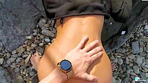 A paradise-like beach is the setting for some hot outdoor sex with a pierced beauty