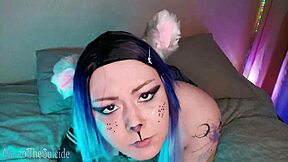 This girl plays with her ponytail in the ass and masturbates a rubber cock