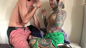 Hot Damn! Tattooed Asian Babe Sucks and Kisses in Homemade Clip!