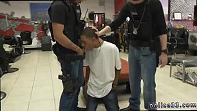 Amateur black gay police officers have sex in a barbershop in a gay hardcore video