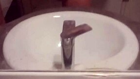 A young gay man indulges in solo masturbation in his private space