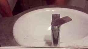 A young gay man indulges in solo masturbation in his private space