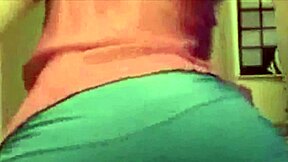 Young blonde teen performs striptease on webcam, undressing and ripping clothes to show her pussy.