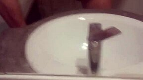 A young gay man indulges in solo masturbation in his private space