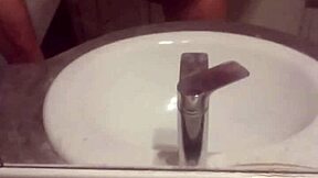 A young gay man indulges in solo masturbation in his private space