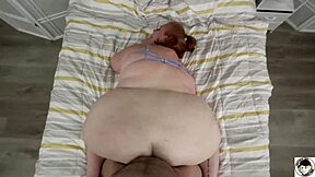 watch this thick redhead get a creampie tease