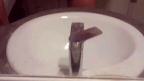 A young gay man indulges in solo masturbation in his private space