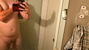 gay man masturbating in porno video