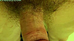 gay man masturbating in porno video