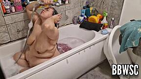 pervert spies on bbw washing giant floppy tits in bath