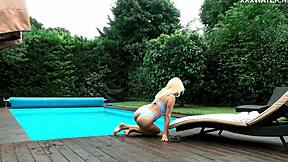 Sexy Milf Emily Ross Reveals Juicy Curves by the Pool