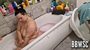 pervert spies on bbw washing giant floppy tits in bath