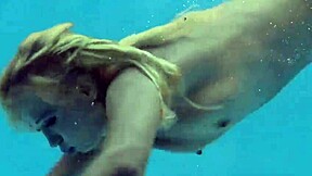 Sexy Milf Emily Ross Reveals Juicy Curves by the Pool