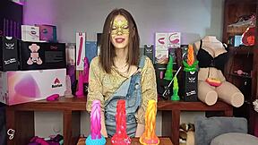 Sarah Sue's small tits bounce during solo play with a white dildo from Wildolo