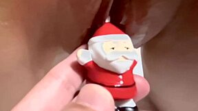 Santa Claus toys with a wet Asian milf's shaved pussy