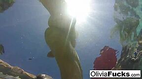 Olivia Austin enjoys a hot summer in the pool