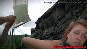 Strict BDSM scene with enema and bondage