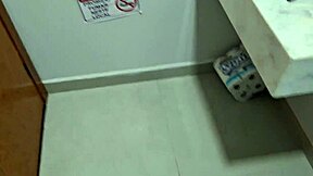 married nurse chats with employee in hospital bathroom