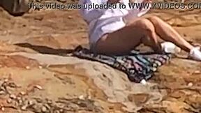 Linda novinha observed having sex publicly on beach rocks