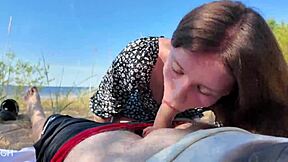 brunette sucks dick on public beach