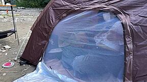 Japanese Brunette Babe Gives Outdoor Blowjob in Tent at Camp