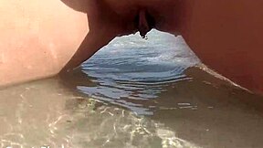 hey, wanna see my shaved pussy peeing on this beach?
