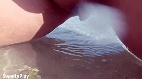 hey, wanna see my shaved pussy peeing on this beach?