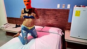 my brunette stepsister celebrates halloween in a hotel bed with a mask