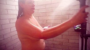Hot Italian woman Vicki has a shower and pleases herself