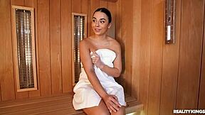 Steamy Sauna Action with a Brunette Getting a Quick Facial!