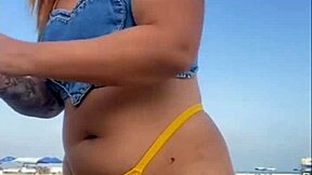 I excite the guy with my flashing on the beach