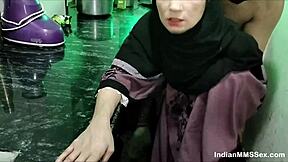 Hot wife in burqa giving a blowjob to her husband in their kitchen