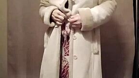 French milf slave teases with strip show outdoors