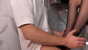 Blonde secretary in nylon gives slick footjob and sucking