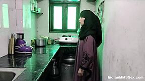 Hot wife in burqa giving a blowjob to her husband in their kitchen