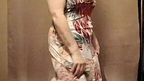 French milf slave teases with strip show outdoors