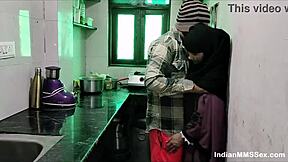 Hot wife in burqa giving a blowjob to her husband in their kitchen