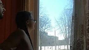 Helga bosk having risky bareback sex by the window with passersby watching