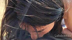 Swallow cum outdoors in this public facial scene