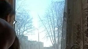 Helga bosk having risky bareback sex by the window with passersby watching