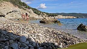 dominant couple peeing on each other at nudist beach, public blowjob too