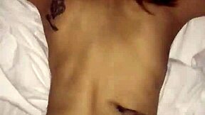 Skinny latina woman checks into a hotel room for a relaxing stay