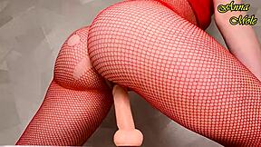 hot milf in red fishnets rides dildo