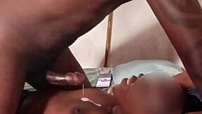 Mature ebony slut gives early morning blowjob to Kenyan dick in sheer red.