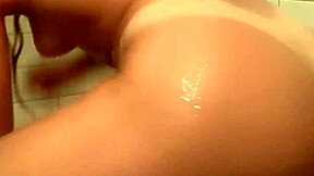 Prostitute Washes Body Then Plays With Anal Dildo