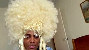 In the bedroom, ebony and blonde amateurs engage in interracial doggystyle and blowjob